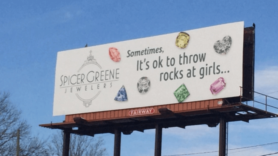 Throw stones at women billboard